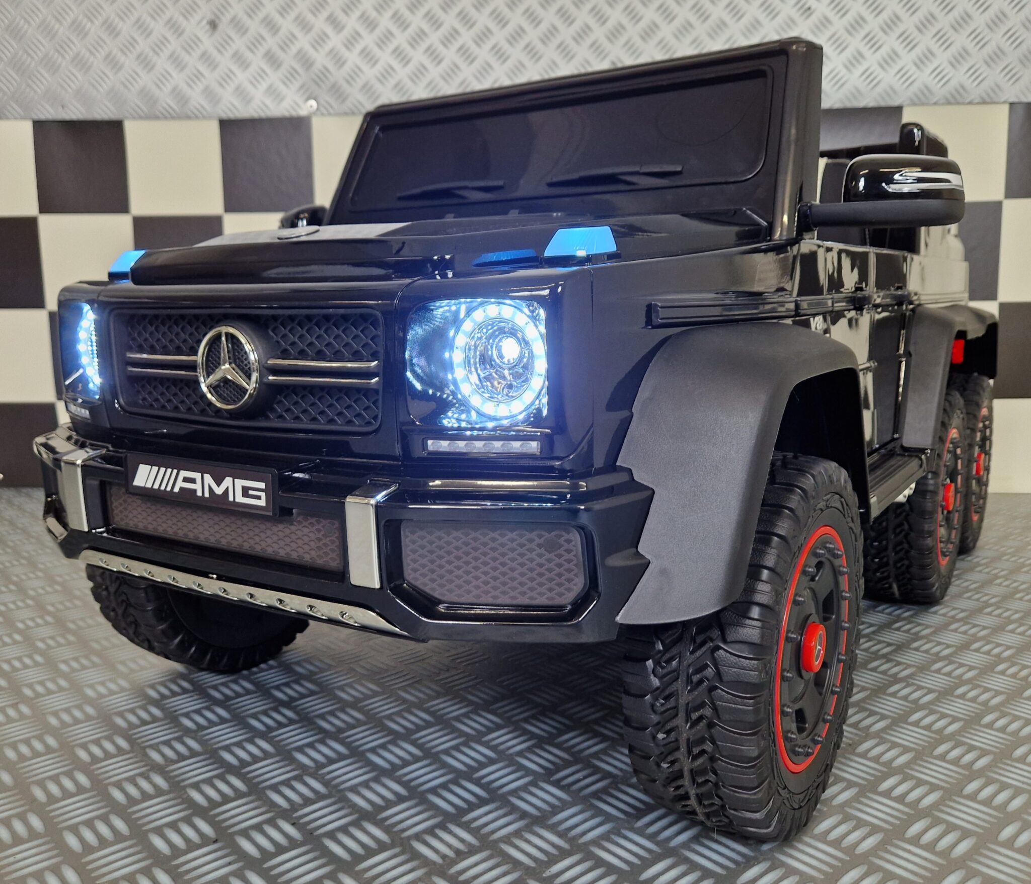 Elektrische-kinderauto-Mercedes-G63-AMG Electric children's car Mercedes G63 6x6 AMG 1 person metallic black - Image 1