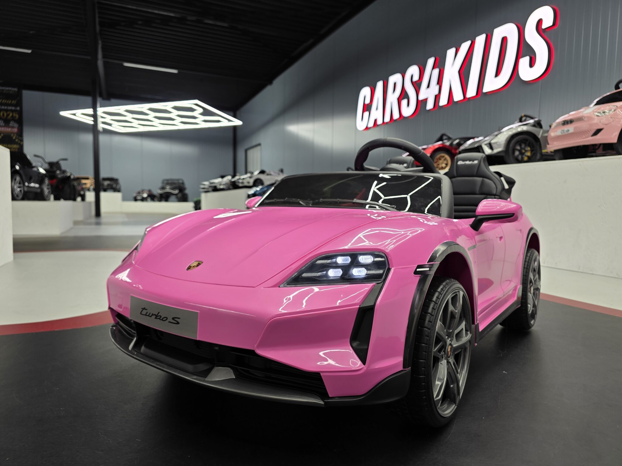 Kinderauto-Porsche-Taycan-2p-roze Children's car Porsche Taycan 2 persons 24 volt pink - Image 1