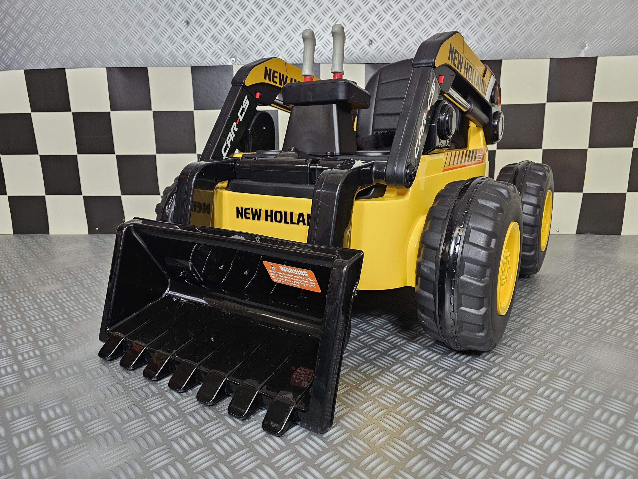 New-Holland-kinder-graafmachine New Holland children's excavator 12 volts - Image 1